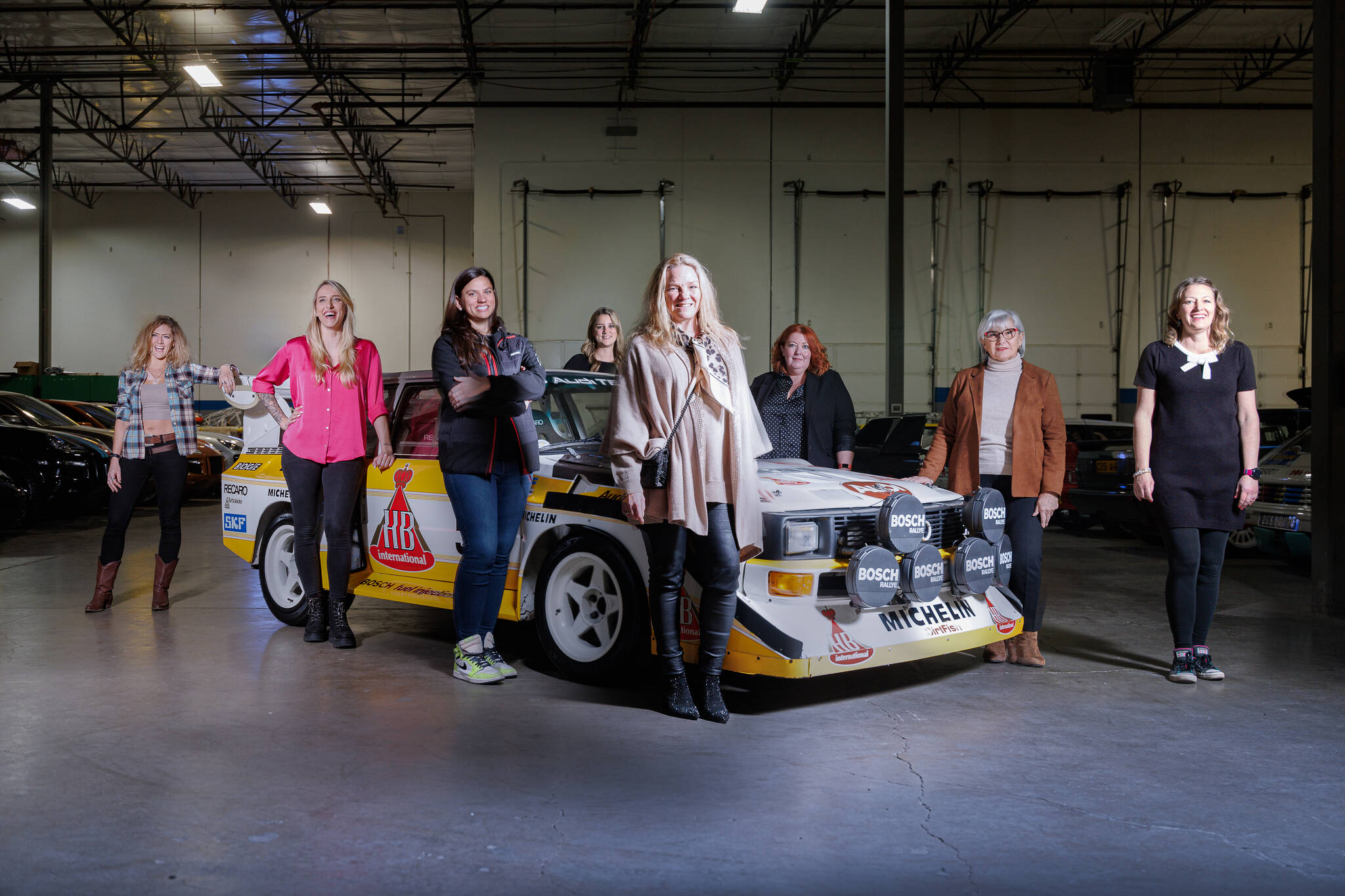 Left to right: (front) Vanessa Ruck, professional motorcycle racer; Jndia Erbacher, Top Fuel drag racer; Michele Abbate, American Trans-Am driver; Pernilla Solberg, rally car driver, co-driver and team manager; (back) Josie Rimmer WIM founder, Becs Williams, lead World Rally Car all live commentator; Michèle Mouton, legend of rally and World Rally Car Event Champion; and Michelle Miller, rally car driver, co-driver and DirtFish senior instructor. Photo courtesy of Karl Noakes